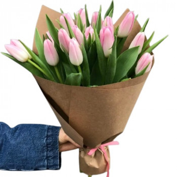 Pink tulips in kraft paper