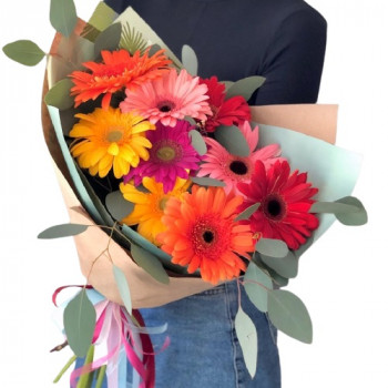 9 different colored gerberas with greens