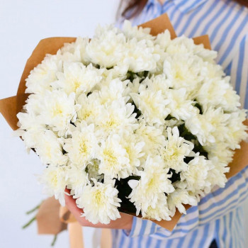 White chrysanthemum bouquet in kraft