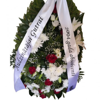 Funeral wreath with mourning ribbon and needle base